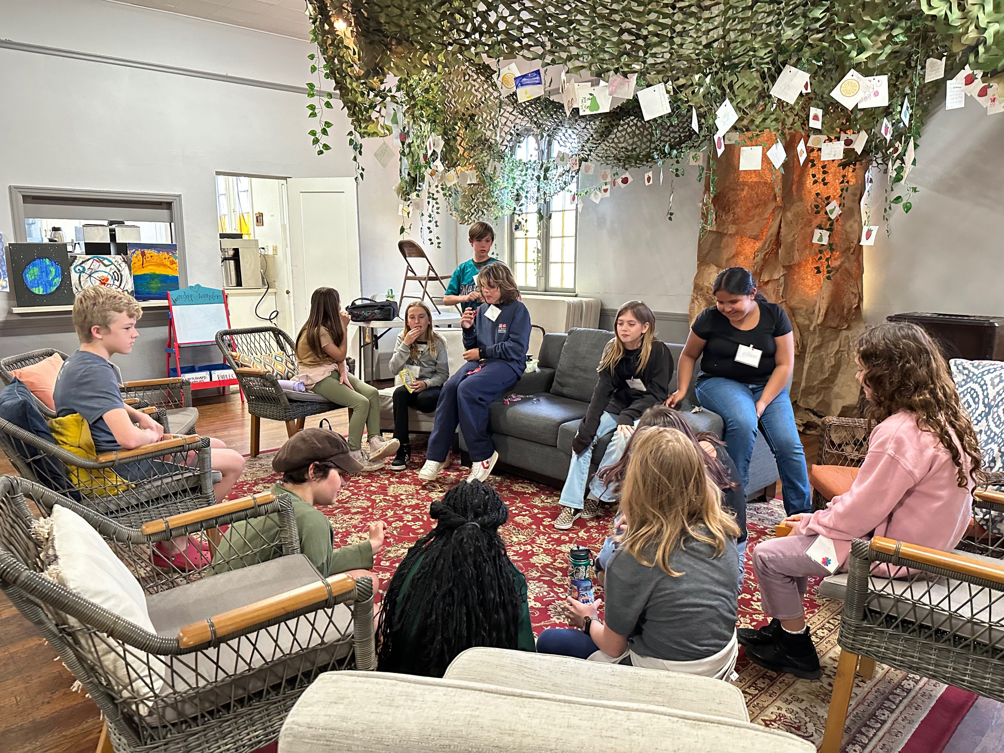 Image of young people sitting and talking